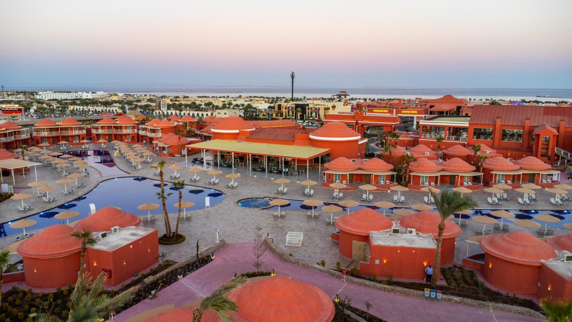 Pickalbatros Laguna Club Resort Sharm El Sheikh Exterior photo Sunset at the Hilton Sharm El Sheikh