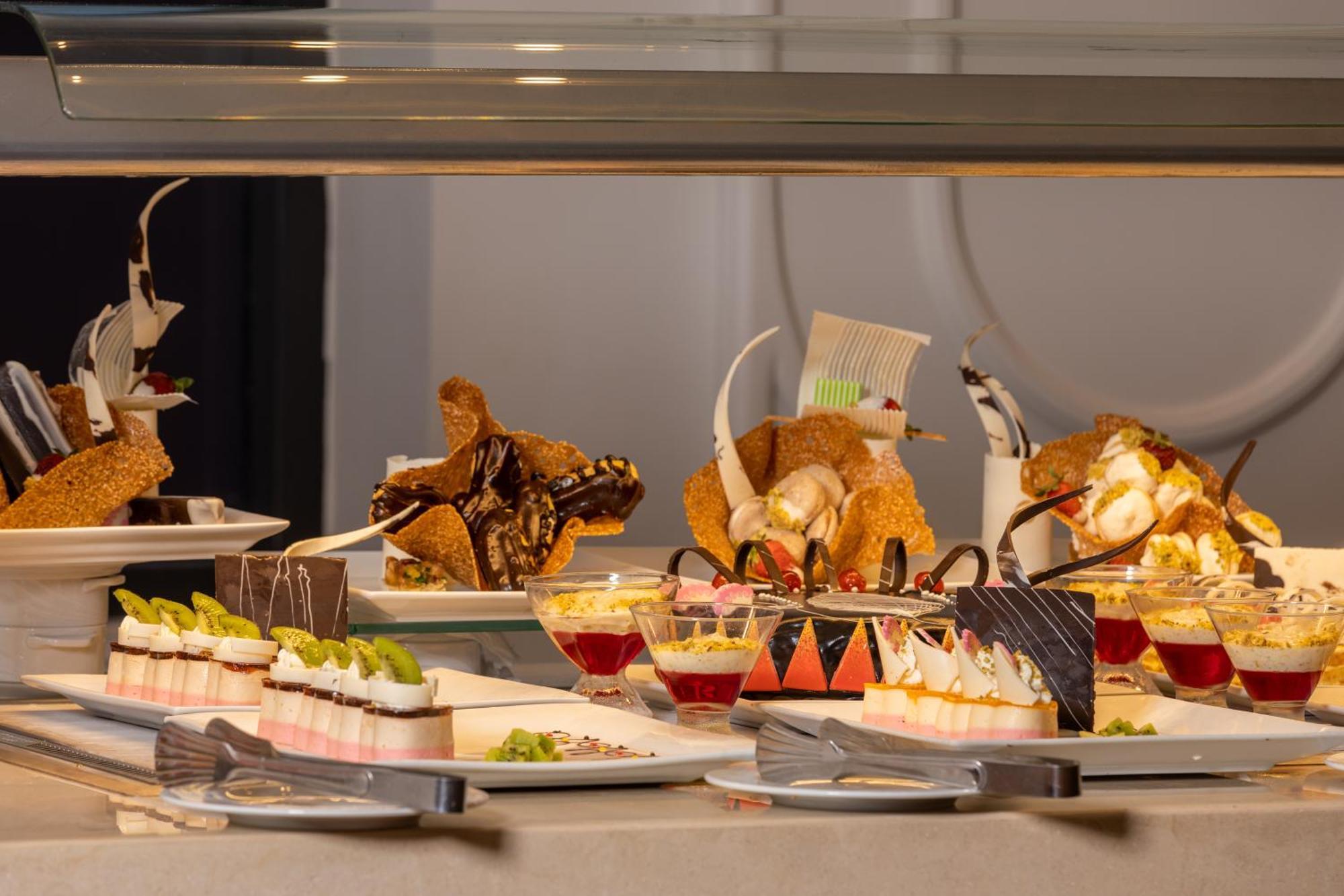 Pickalbatros Laguna Club Resort Sharm El Sheikh Exterior photo A display of desserts